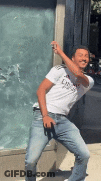 A Man Wearing A White Shirt That Says Emirates GIF