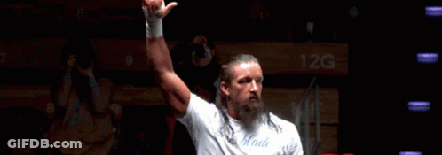 A Man Wearing A White Shirt That Says ' Powerblade ' On It GIF