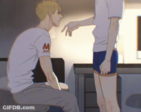 A Man Wearing A White Shirt With The Letter M On It Talks To Another Man GIF