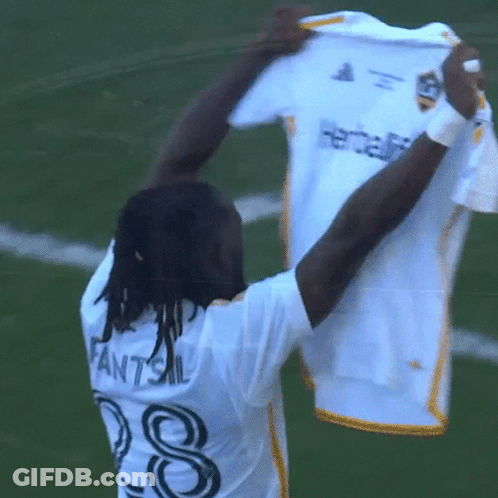 A Man Wearing A White Shirt With The Name Fantsil On The Back GIF