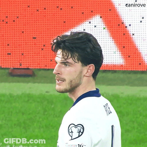 A Man Wearing A White Shirt With The Number 1 On It GIF