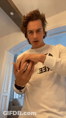 A Man Wearing A White Shirt With The Number 33 On The Front GIF