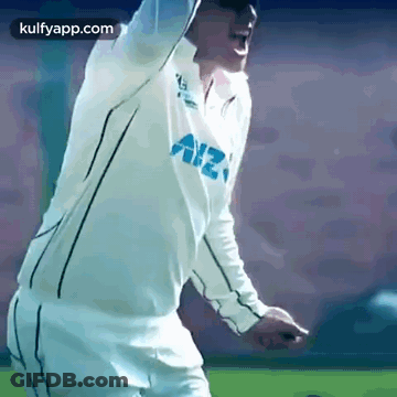 A Man Wearing A White Shirt With The Word Allianz On It GIF