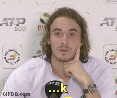 A Man Wearing A White Shirt With The Word Atp 500 On It GIF