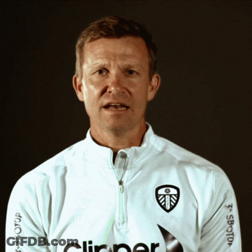 A Man Wearing A White Shirt With The Word Clipper On The Front GIF