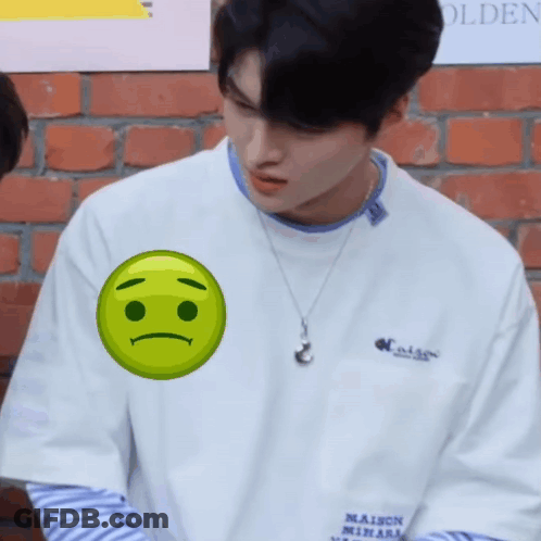 A Man Wearing A White Shirt With The Word Maison On The Front GIF