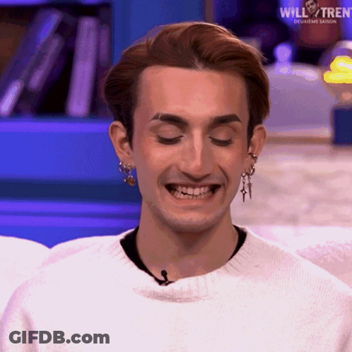 Man In White Sweater Earrings Smiling Will & Tren GIF