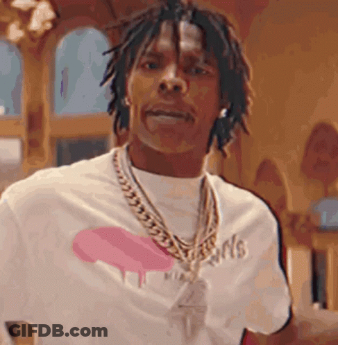 A Man Wearing A White T-Shirt And A Gold Chain Around His Neck . GIF