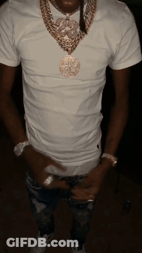 A Man Wearing A White T-Shirt And A Gold Necklace GIF