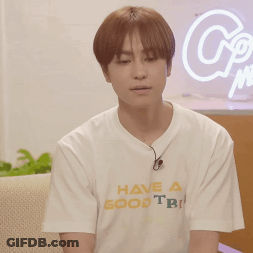A Man Wearing A White T-Shirt That Says Have A Good Trip GIF