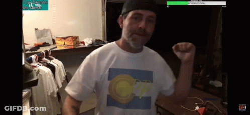 A Man Wearing A White T-Shirt With A Picture Of A Circle On It GIF