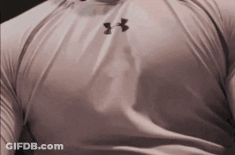 A Man Wearing A White Under Armour Shirt With Black Letters GIF
