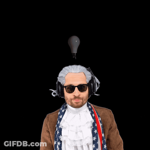 A Man Wearing A Wig And Headphones Points At The Camera With The Words That 'S A Good Idea Behind Him GIF