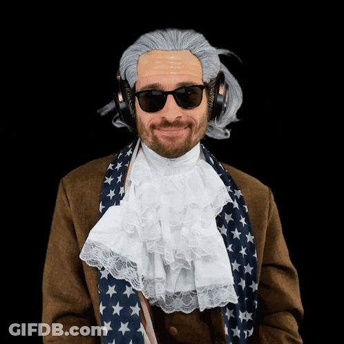 A Man Wearing A Wig And Sunglasses Has Headphones On GIF