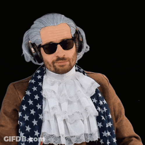 A Man Wearing A Wig And Sunglasses Has Headphones On His Ears GIF