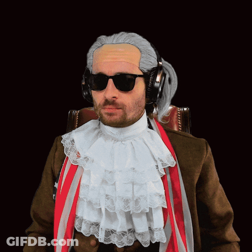 A Man Wearing A Wig And Sunglasses Has Headphones On His Ears GIF