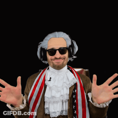 A Man Wearing A Wig And Sunglasses Holds His Hands Out GIF