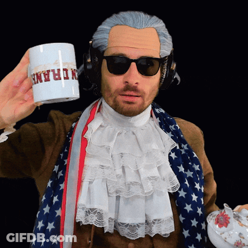 A Man Wearing A Wig And Sunglasses Is Holding A Mug That Says Frank GIF
