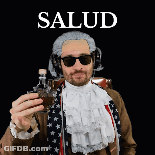 A Man Wearing A Wig And Sunglasses Is Holding A Shot Glass And The Word Salud Is Above Him GIF