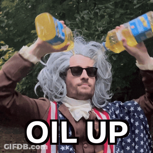 A Man Wearing A Wig And Sunglasses Is Pouring Oil Over His Head With The Words " Oil Up " Below Him GIF