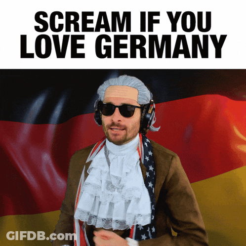 A Man Wearing A Wig And Sunglasses Is Screaming That He Loves Germany GIF