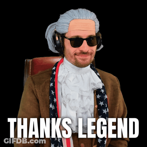 A Man Wearing A Wig And Sunglasses Is Sitting In A Chair And Says Thanks Legend GIF