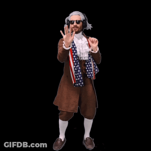 A Man Wearing A Wig And Sunglasses Is Smiling GIF