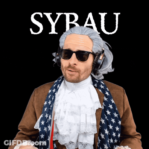 A Man Wearing A Wig And Sunglasses Is Standing In Front Of A Black Background With The Word Sy Rau On It GIF
