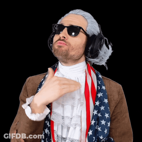 Man Wearing Wig And Sunglasses With American Flag Scarf GIF