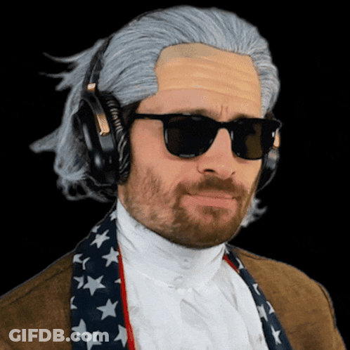 A Man Wearing A Wig And Sunglasses Is Wearing Headphones And An American Flag Scarf GIF