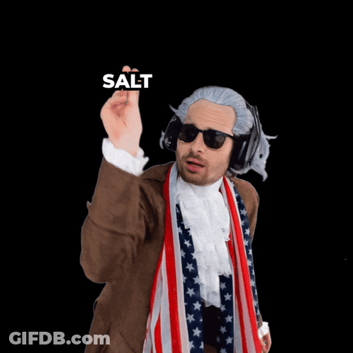 A Man Wearing A Wig And Sunglasses Pointing At The Camera With The Words Salt Behind Him GIF
