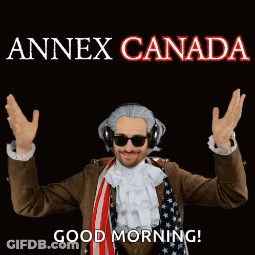A Man Wearing A Wig And Sunglasses Says Good Morning In Front Of A Sign That Says Annex Canada GIF