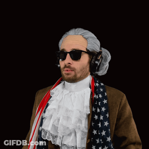 A Man Wearing A Wig And Sunglasses Says " Wait What " GIF