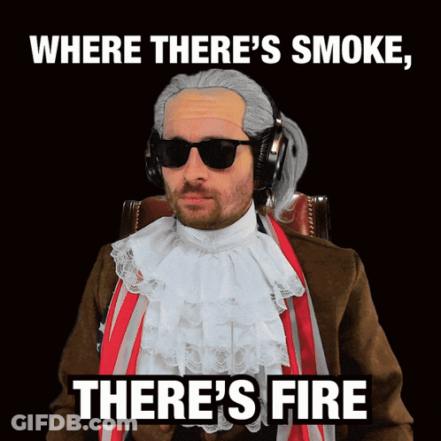A Man Wearing A Wig And Sunglasses Says Where There 'S Smoke , There 'S Fire GIF