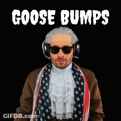 A Man Wearing A Wig And Sunglasses Stands In Front Of A Black Background With The Words Goose Bumps On It GIF