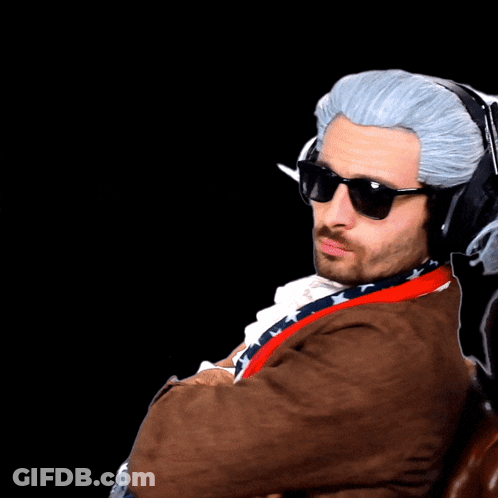 A Man Wearing A Wig And Sunglasses With Headphones On His Head GIF