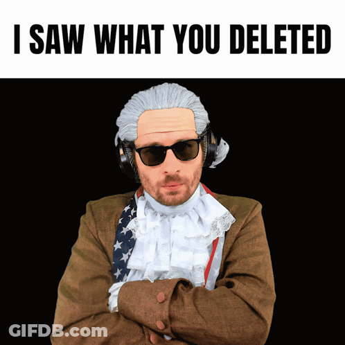 A Man Wearing A Wig And Sunglasses With The Words " I Saw What You Deleted " Above Him GIF