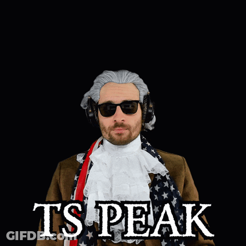 A Man Wearing A Wig And Sunglasses With The Words Ts Peak Above His Head GIF