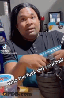 A Man Wearing A Wig Is Holding A Black Purse And Says Who The Fuck Did Your Hair . GIF