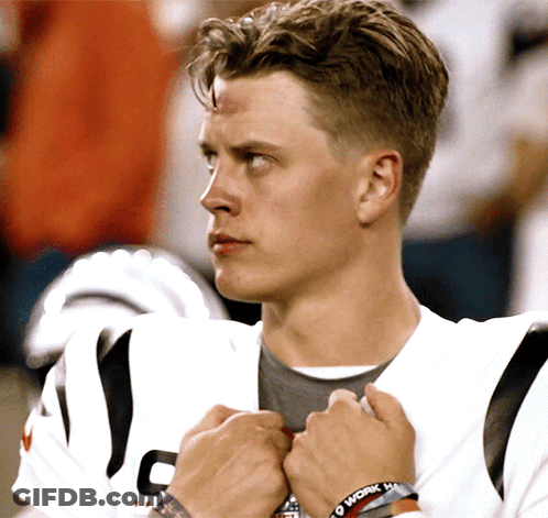 A Man Wearing A Wristband That Says " I Work Hard " GIF