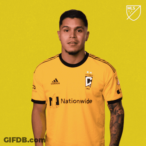 A Man Wearing A Yellow Adidas Jersey With The Word Vamos On The Bottom GIF