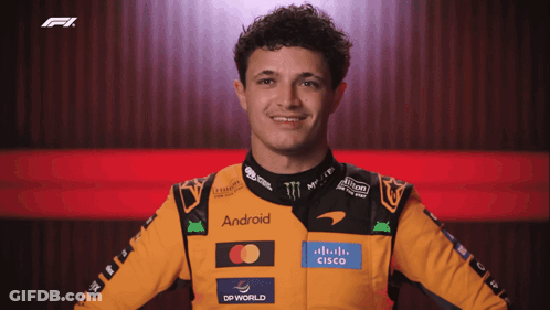 A Man Wearing A Yellow And Black Jacket With The Word Android On It GIF