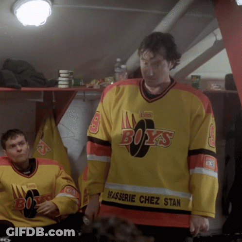 A Man Wearing A Yellow And Red Boys Jersey GIF