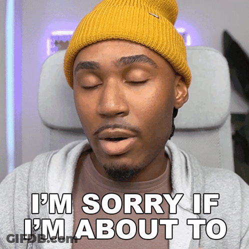 A Man Wearing A Yellow Beanie Is Saying I 'M Sorry If I 'M About To GIF