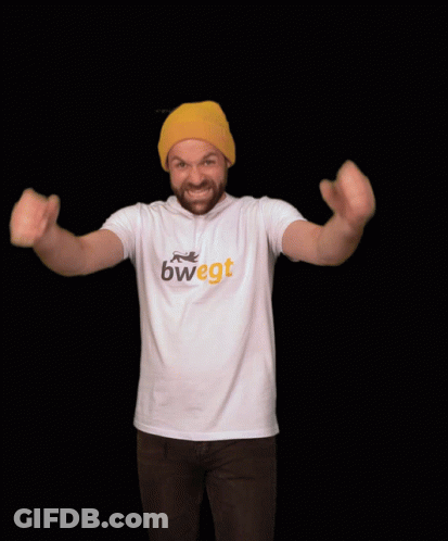 A Man Wearing A Yellow Hat And A White Shirt That Says Bwegt GIF