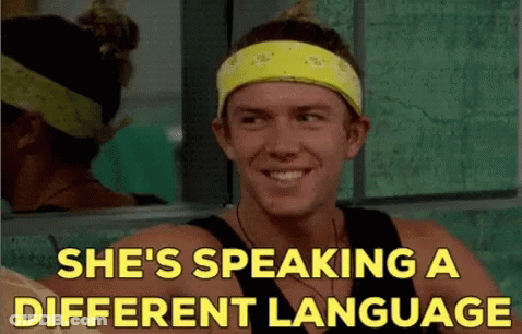 A Man Wearing A Yellow Headband With The Words She 'S Speaking A Different Language GIF