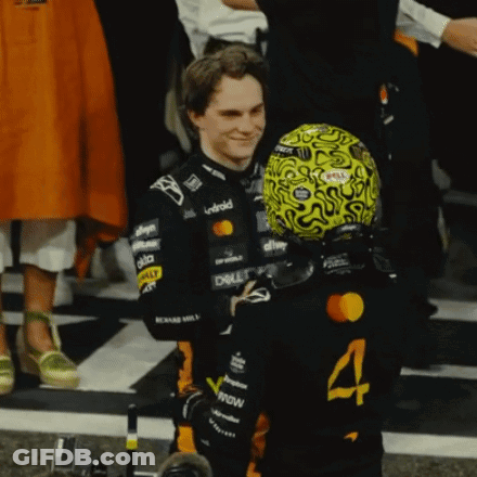 A Man Wearing A Yellow Helmet With The Number 4 On It GIF