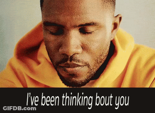 A Man Wearing A Yellow Hoodie Is Thinking About You GIF