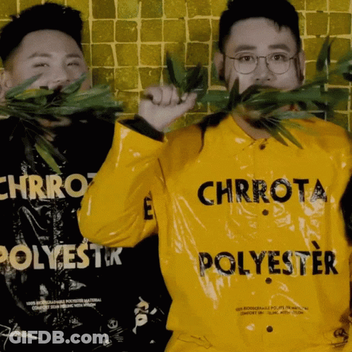 A Man Wearing A Yellow Jacket That Says Chrrot Polyester GIF