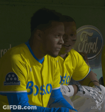 A Man Wearing A Yellow Jersey That Says Boston GIF